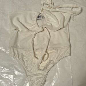 Open front bodysuit.. toes in front. Can be also tied around neck